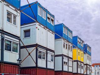 A modern metal building made entirely from shipping containers.jpg
